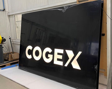 BROSSIER SADERNE CREATES THE BACKLIT SIGNS FOR THE CARGO GROUP'S SHOWROOM!